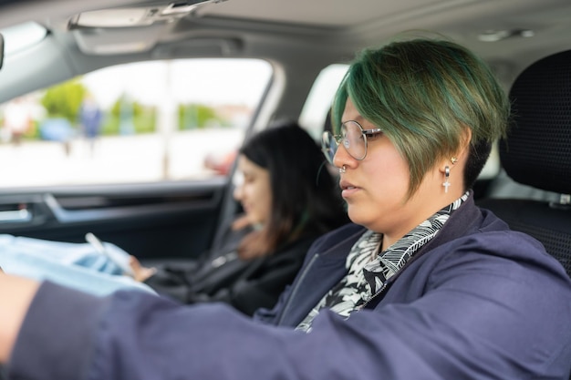 Lesbian couple inside a car