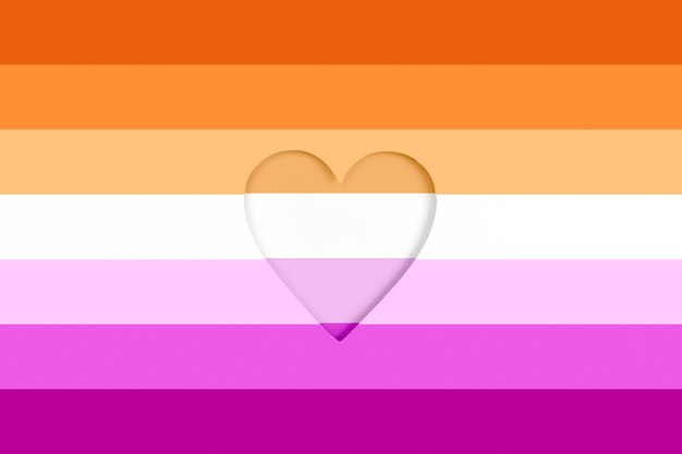 Lesbian flag background rainbow printed cardboard with diecut heart shape top view