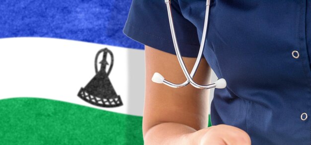 Lesotho flag female doctor with stethoscope, national healthcare system