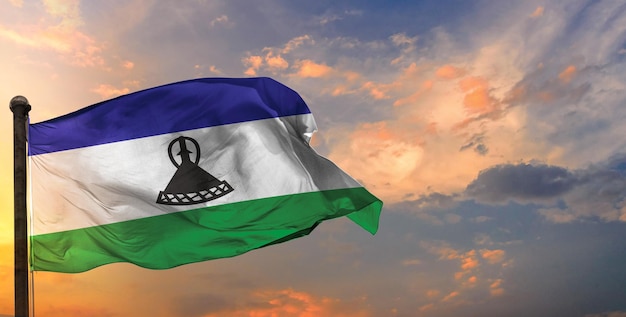 The lesotho waving flag and sky background.