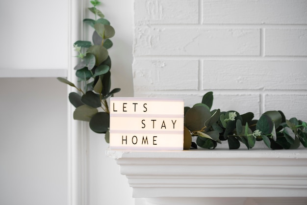 Let's stay home message on lightbox