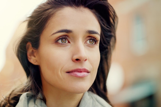 Let the world stare and wonder where you came from Closeup shot of an attractive young woman in the city