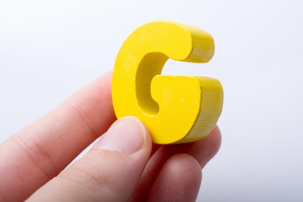 Photo letter cube of g of alphabet made of wood