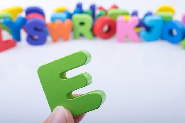 Letter cubes of e made of wood