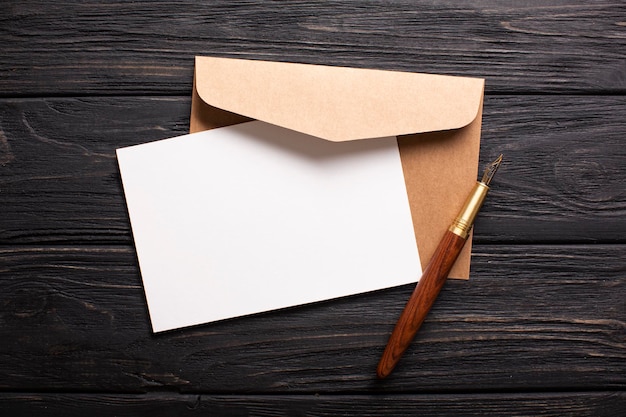 Letter on dark wooden background