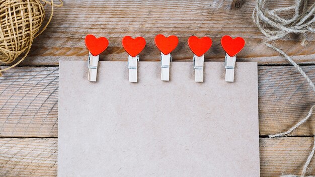 A letter from craft paper decorated with a handmade heart for Valentine's Day