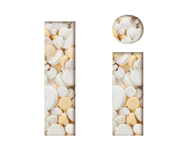 Photo letter i of english alphabet made of tablets