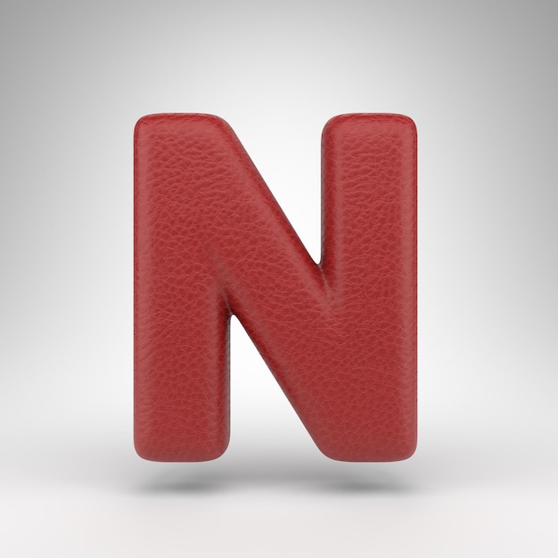 Photo letter n uppercase on white background. red leather 3d letter with skin texture.