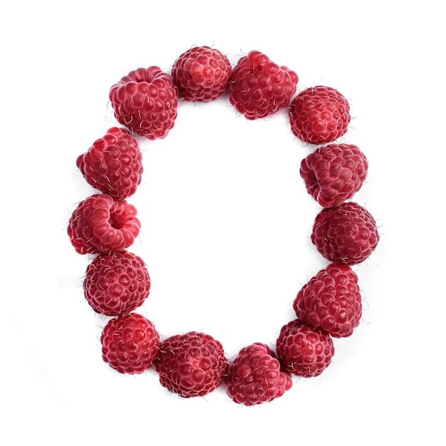 Photo the letter o of the english alphabet of red ripe raspberries