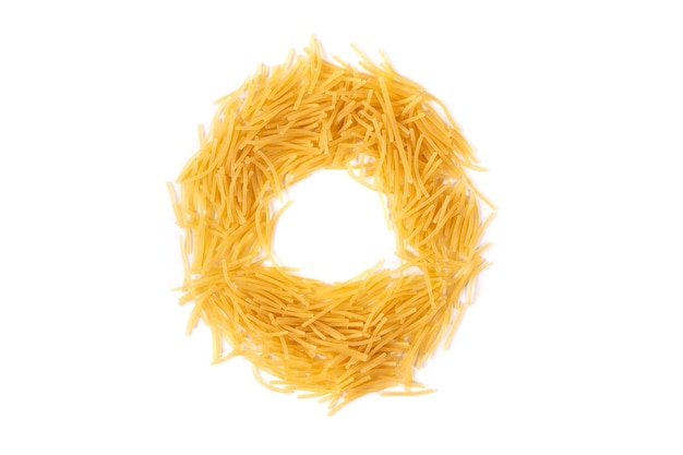 Letter O from raw chopped noodles isolated on white background High quality photo