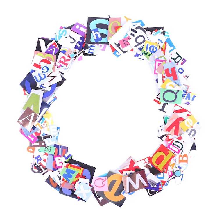Photo letter o made of colorful newspaper letters isolated on white