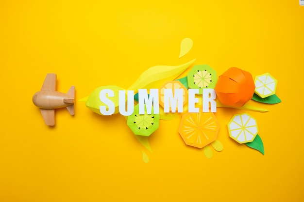 Photo letter summer cut from paper with tropical fruit paper