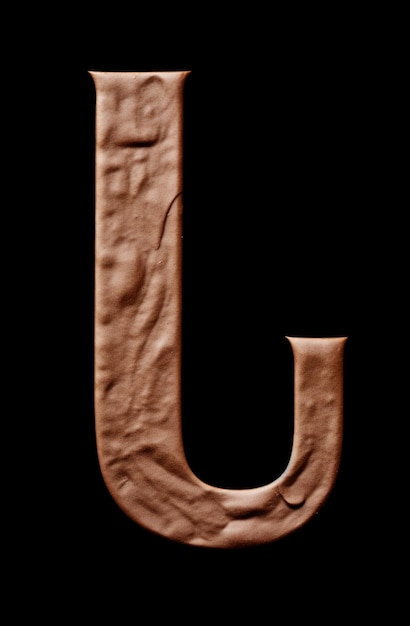 a letter u is visible on a black background.