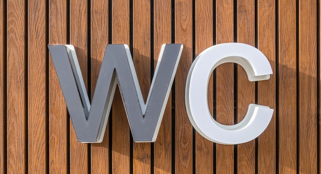 Letter WC on wooden planks