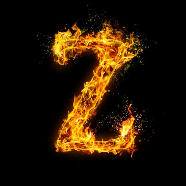 文字Z。黒に炎を放ち、火花を伴うリアルな火の効果。