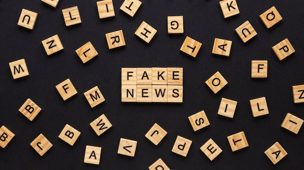letters forming fake news message