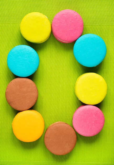 Letters from traditional french colorful macarons