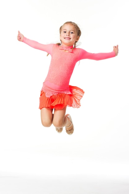 Leuke jonge tapdanser in rood Leuk schoolmeisje in verschillende danskostuums en leuke poses