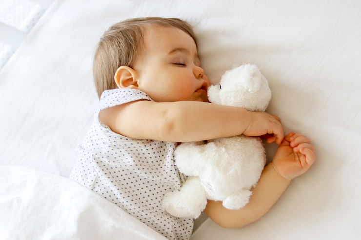 Foto leuke kleine baby die slaapt.