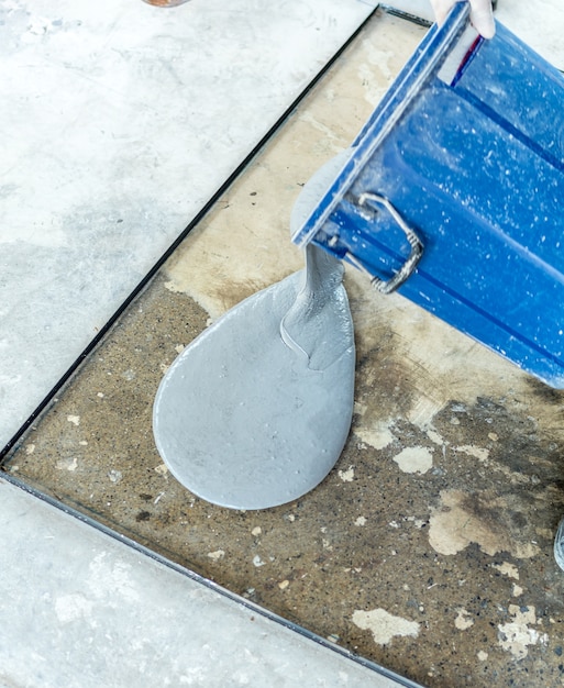 Photo leveling mixed terrazzo mortar into mold