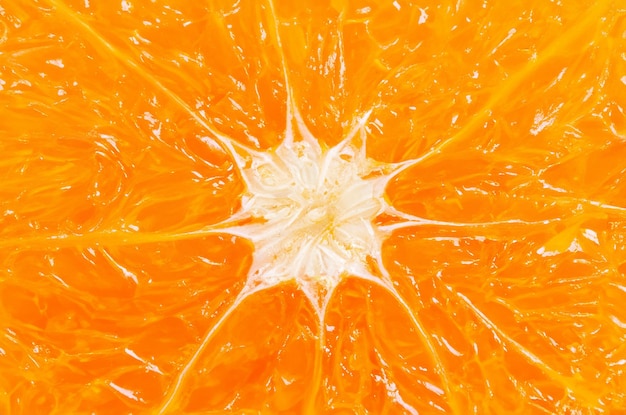 Levendige oranje achtergrond gemaakt van vers gesneden sinaasappels