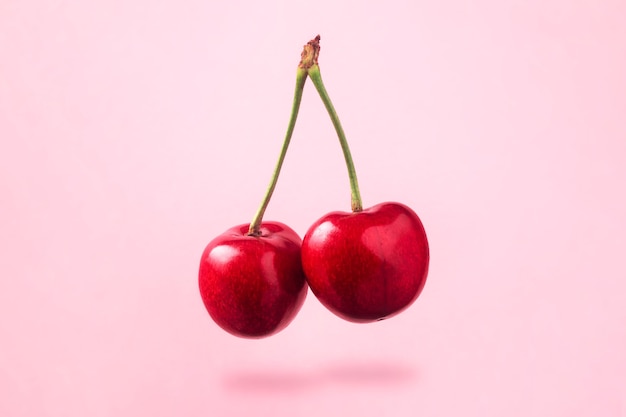 Levitating red cherries