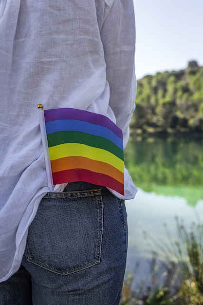 LGBT flag in the field. Pride. Freedom concept