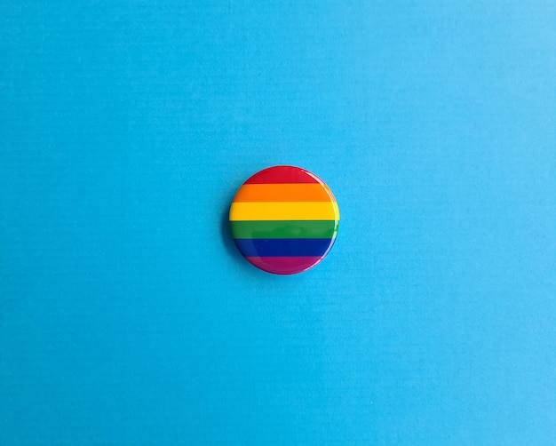 LGBT icon in shape of a circle on rainbow flag