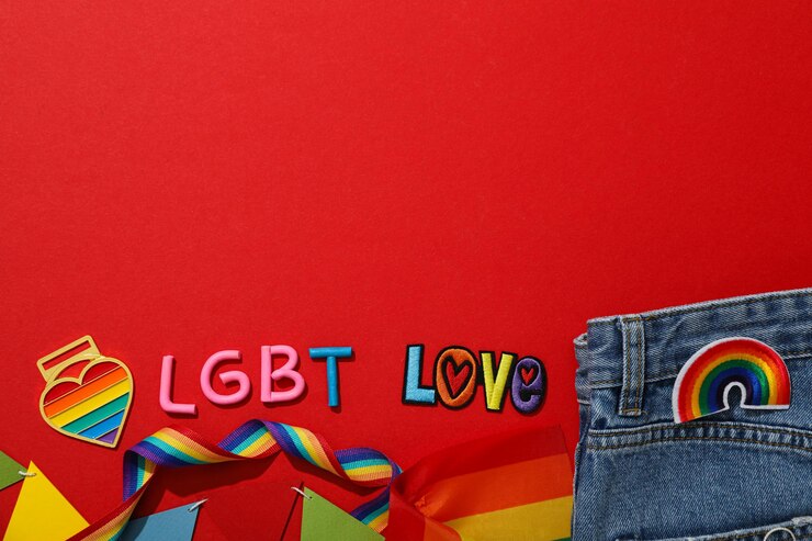 Photo lgbt パレードコンセプト 赤い背景のカラフルなシンボル