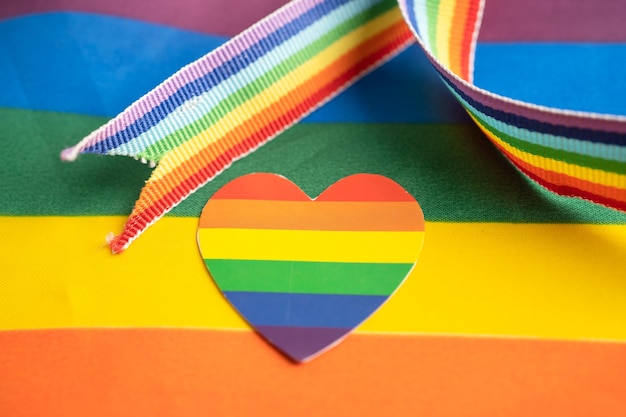 LGBT rainbow colorful flag heart and ribbon symbol of lesbian gay bisexual transgender human rights tolerance and peace