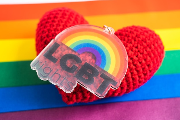 LGBT Rights with red heart on rainbow flag symbol of LGBT pride month celebrate annual in June social of gay lesbian bisexual transgender human rights