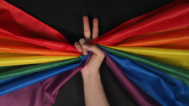 Photo lgbtq flag or lesbian gay bi sexsual transgender queer or homosexsual pride rainbow flag.