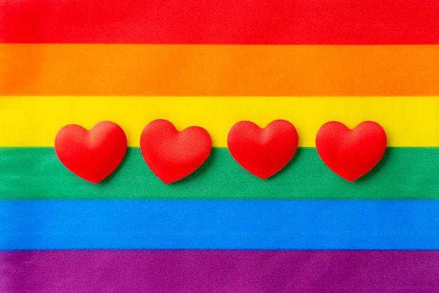 LGBTQ flag and symbol on table top view