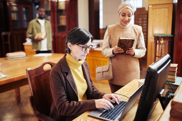 Librarian Working with Clients