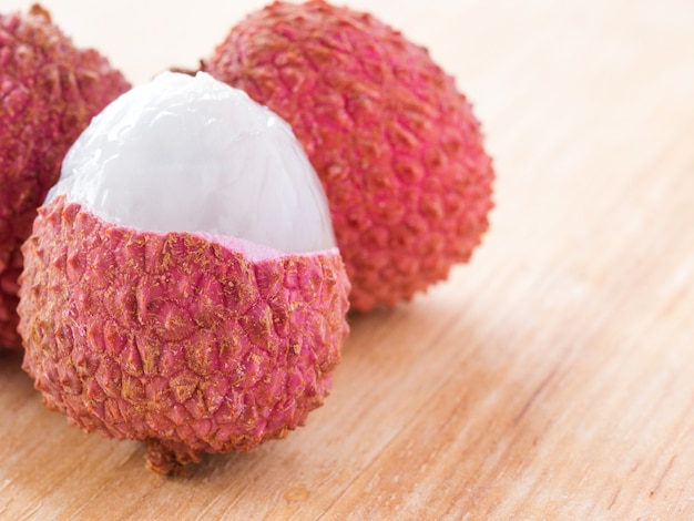 lichee fruit on wooden table close up