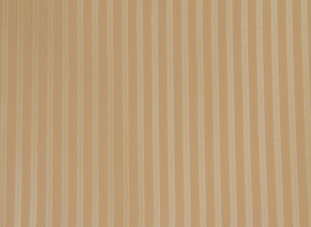 Licht beige perzik gestreepte stof. Stof textuur, achtergrond voor design.