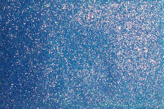 Lichtblauw Glitter getextureerde Shimmer Achtergrondtextuur.Spark Selective Focus.Christmas.Winter decor