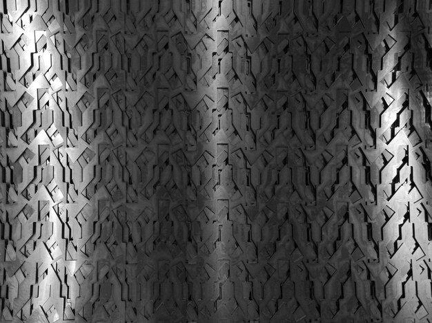 Foto lichte gloed op grillpatroon donkere korrelige industriële abstracte achtergrond