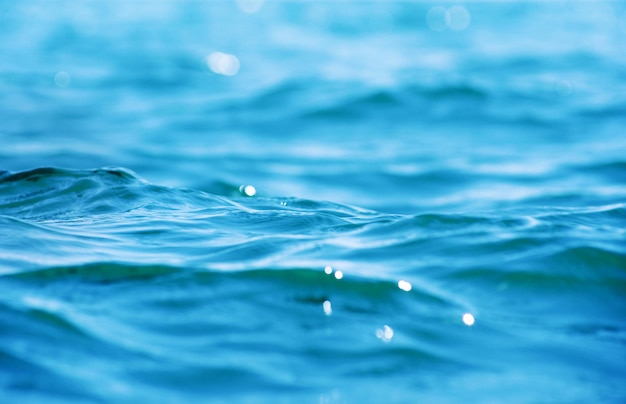 Lichten op zee achtergrond Golven