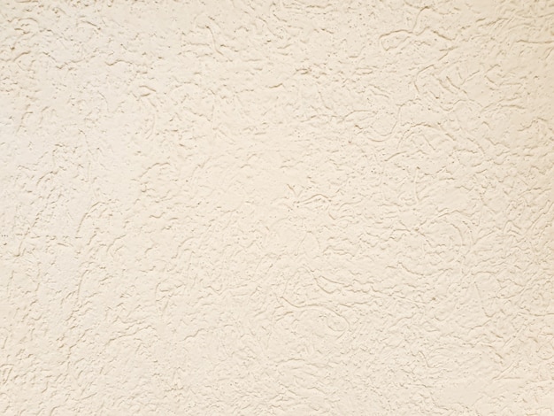 Lichtgeel of beige gips muur textuur
