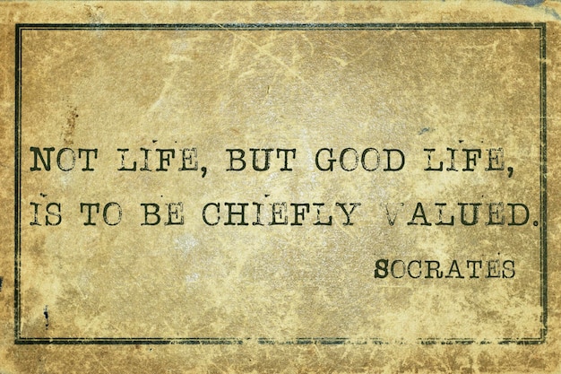 Not life but good life ancient Greek philosopher Socrates quote printed on grunge vintage cardboard