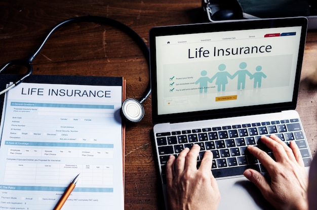 Photo life insurance plan on laptop screen