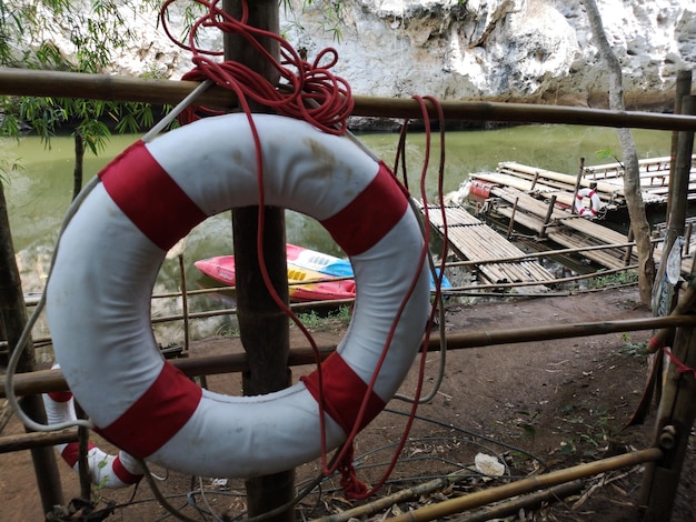 Life saving equipment life rings the rescuer helps a drowning
person