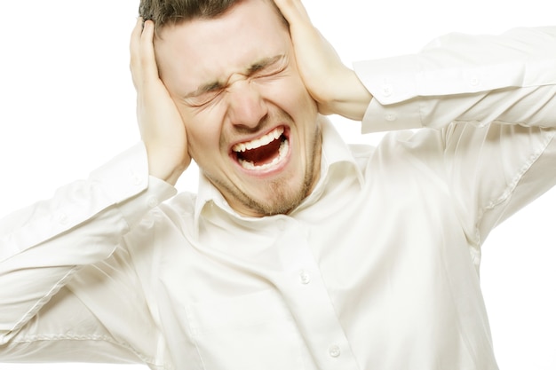 Life style, business and people concept: young office worker mad by stress screaming isolated on white