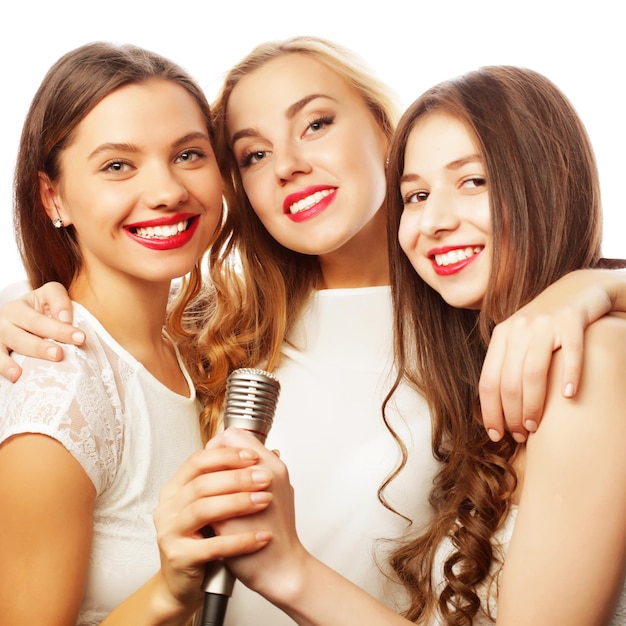 life style happiness emotional and people concept group of young women having fun at karaoke