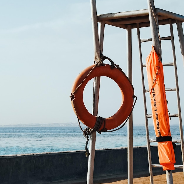 Lifebuoy on lifeguard watchtower on the beach