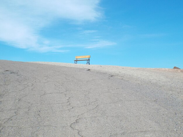 Lifeguard hut on beach against sky