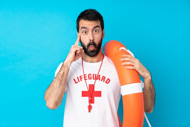 Lifeguard man thinking an idea