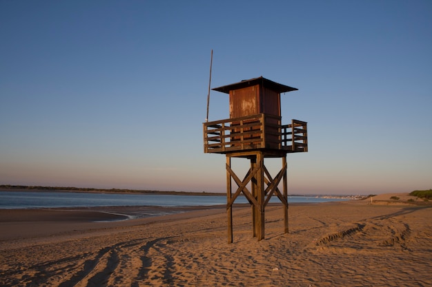 Lifeguard tower on the shore of the beach