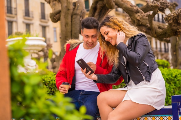 Lifestyle of a Caucasian couple sightseeing on vacation, in a city park